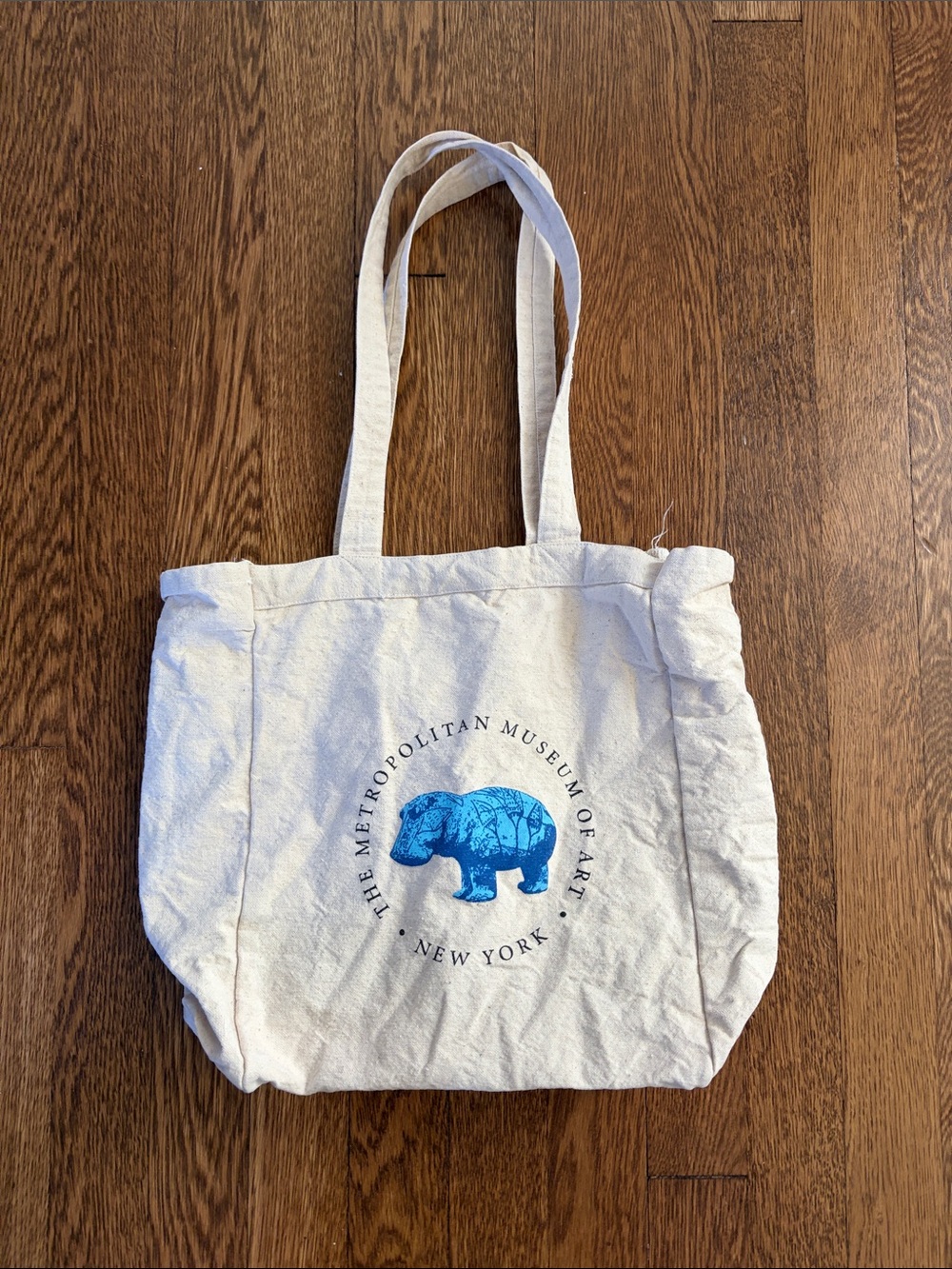 The Metropolitan Museum of Art The Met blue Hippo William canvas tote bag